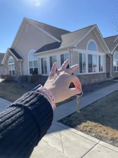 First-time homebuyers in Northwest Indiana receiving their new home keys.